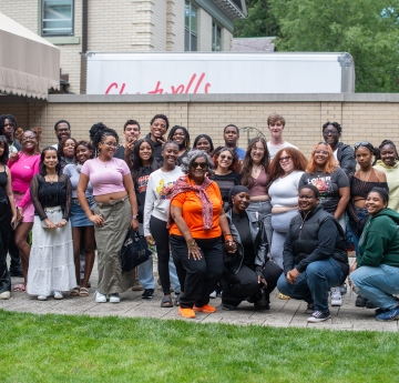 Photo of RAs in Pool Party with University President